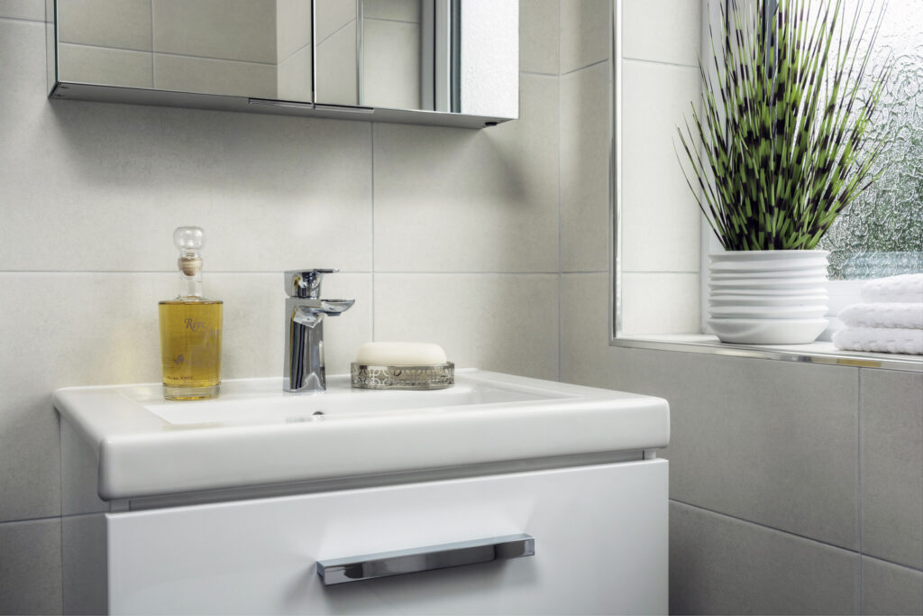 Professional bathroom installation in Mill Hill featuring a square basin and a chrome basin tap as the main focal points