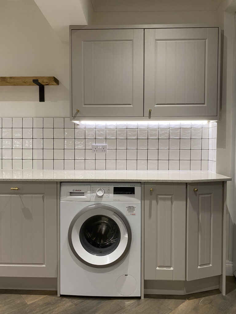 Professional kitchen installation in Totteridge featuring a shaker kitchen and a square tiles as the main focal points