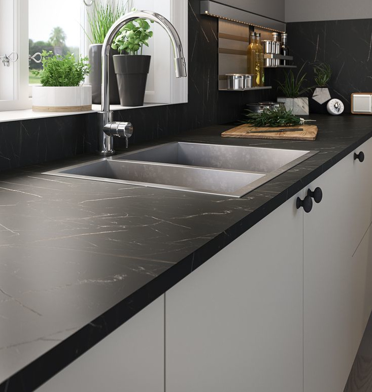 Professional worktop installation in Radlett featuring a bushboard laminate worktop and a stone effect finish as the main focal points