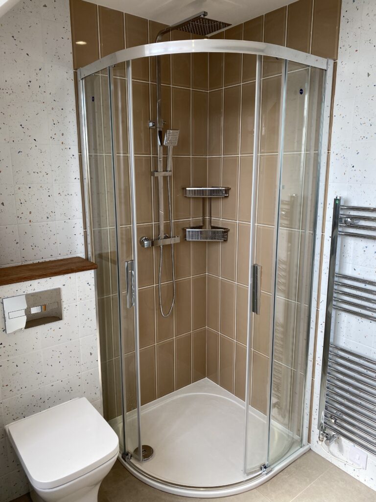 Professional bathroom installation in Arkley featuring a luxury bathroom and a quadrant shower as the main focal points