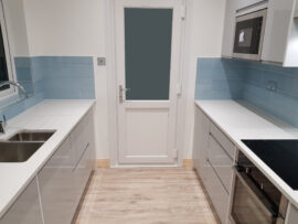 Professional kitchen installation in Mill Hill featuring a handleless kitchen and a corian worktop as the main focal points. The design is completed with a metro tiles and a natural wood flooring for a cohesive modern finish. Project completed by A Martens Kitchens & Bathrooms Ltd. For a free quote, visit https://amartens.co.uk to discuss your kitchen renovation. Professional kitchen installation in Mill Hill featuring a handleless kitchen and a corian worktop as the main focal points