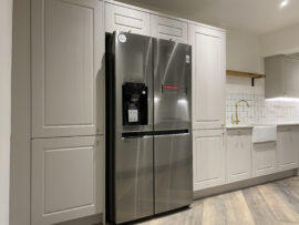 Professional kitchen installation in Totteridge featuring a freestanding fridge freezer and a shaker kitchen as the main focal points. The design is completed with a belfast sink and a square tiles for a cohesive modern finish. Project completed by A Martens Kitchens & Bathrooms Ltd. For a free quote, visit https://amartens.co.uk to discuss your kitchen renovation. Professional kitchen installation in Totteridge featuring a freestanding fridge freezer and a shaker kitchen as the main focal points.