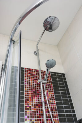 Professional bathroom installation in Mill Hill featuring a chrome expose shower and a mosaic tiles as the main focal points. The design is completed with a porcelain tiles for a cohesive modern finish. Project completed by A Martens Kitchens & Bathrooms Ltd. For a free quote, visit https://amartens.co.uk to discuss your bathroom renovation. Professional bathroom installation in Mill Hill featuring a chrome expose shower and a mosaic tiles as the main focal points