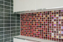 Professional bathroom installation in Mill Hill featuring a shower niche and a mosaic tiles as the main focal points. The design is completed with a porcelain tiles for a cohesive modern finish. Project completed by A Martens Kitchens & Bathrooms Ltd. For a free quote, visit https://amartens.co.uk to discuss your bathroom renovation. Professional bathroom installation in Mill Hill featuring a shower niche and a mosaic tiles as the main focal points