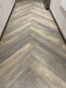 Professional kitchen installation in Totteridge featuring a wood porcelain tiles and a wood finish as the main focal points. The design is completed with a flooring for a cohesive modern finish. Project completed by A Martens Kitchens & Bathrooms Ltd. For a free quote, visit https://amartens.co.uk to discuss your kitchen renovation. Professional kitchen installation in Totteridge featuring a wood porcelain tiles and a wood finish as the main focal points