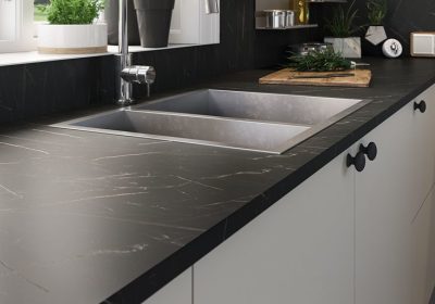 Professional worktop installation in Radlett featuring a bushboard laminate worktop and a stone effect finish as the main focal points