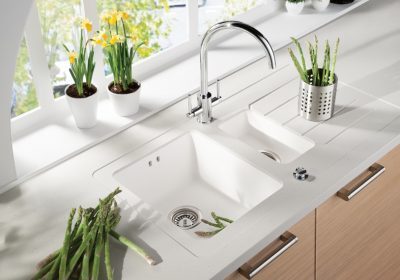 Professional worktop installation in Radlett featuring a maia solid surface and a sink modules as the main focal points